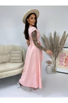 Rózsaszín ruha övvel, aszimmetrikus szabás, V nyakkivágás, eleje gombos